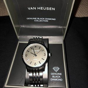 Van Heusen Genuine Diamond Collection Silver color men's metal watch.
